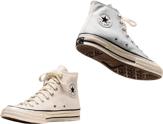 A pair of canvas high-top sneakers, one suspended mid-air