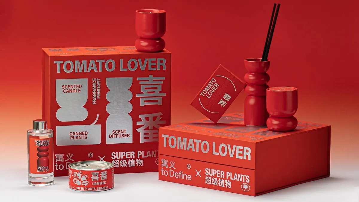 A red-on-red key visual: scented candle, diffuser and canned plants staged on a red plinth